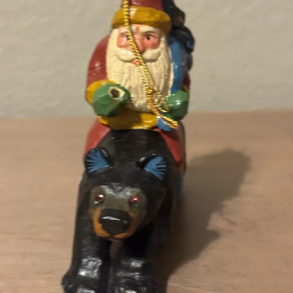 House of Hatten Santa Riding Black Bear Figurine